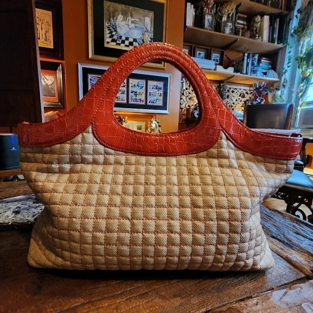 STUART WEITZMAN quilted tote with orange patent leather accents & gold hardware